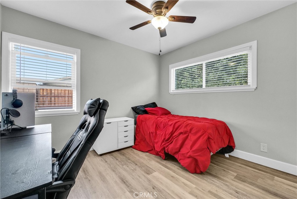 3625 Ross Street Riverside, CA 92503 - Photo 17 of 29 a living room with a bed furniture and a window