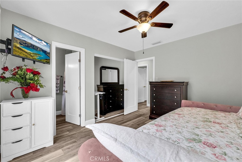 3625 Ross Street Riverside, CA 92503 - Photo 22 of 29 a bedroom with a bed and a dresser in it