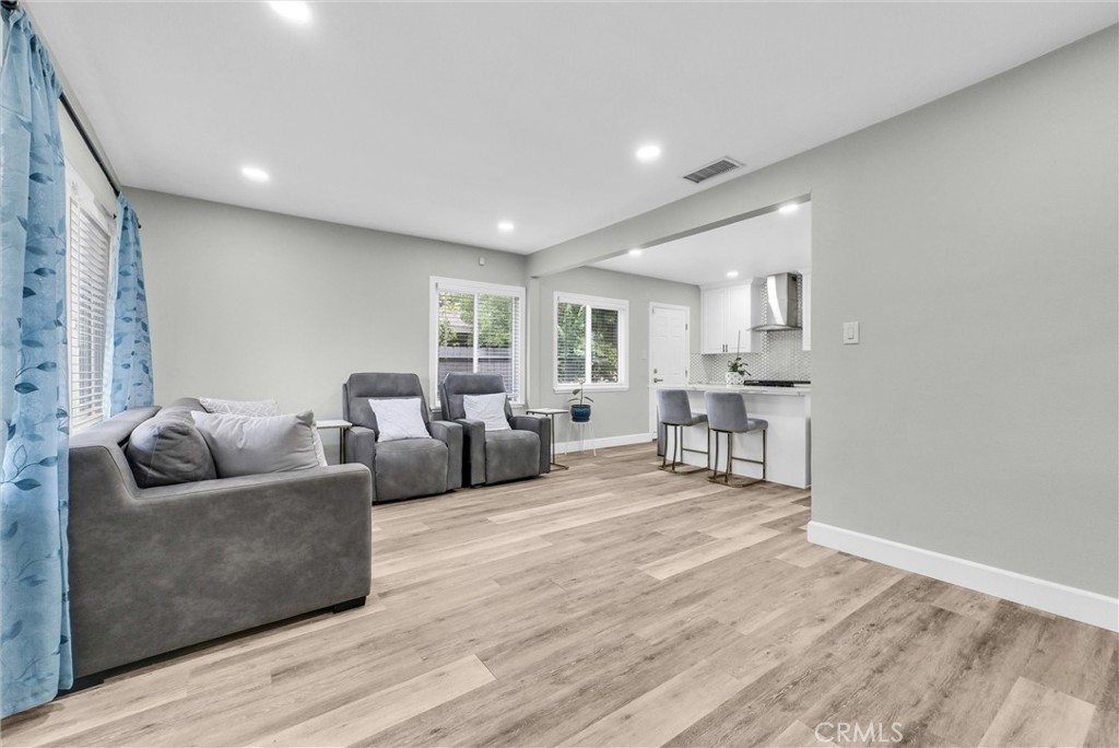3625 Ross Street Riverside, CA 92503 - Photo 5 of 29 a living room with furniture and a wooden floor