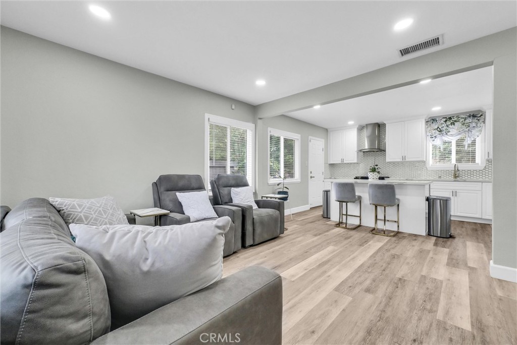 3625 Ross Street Riverside, CA 92503 - Photo 6 of 29 a living room with furniture and a wooden floor
