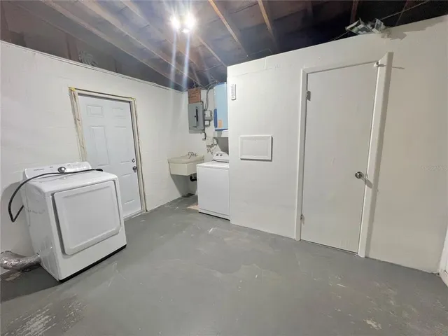 a utility room with dryer and washer