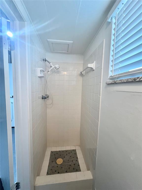 5137 Cicero Drive New Port Richey, FL 34652 - Photo 15 of 16 a bathroom with a shower