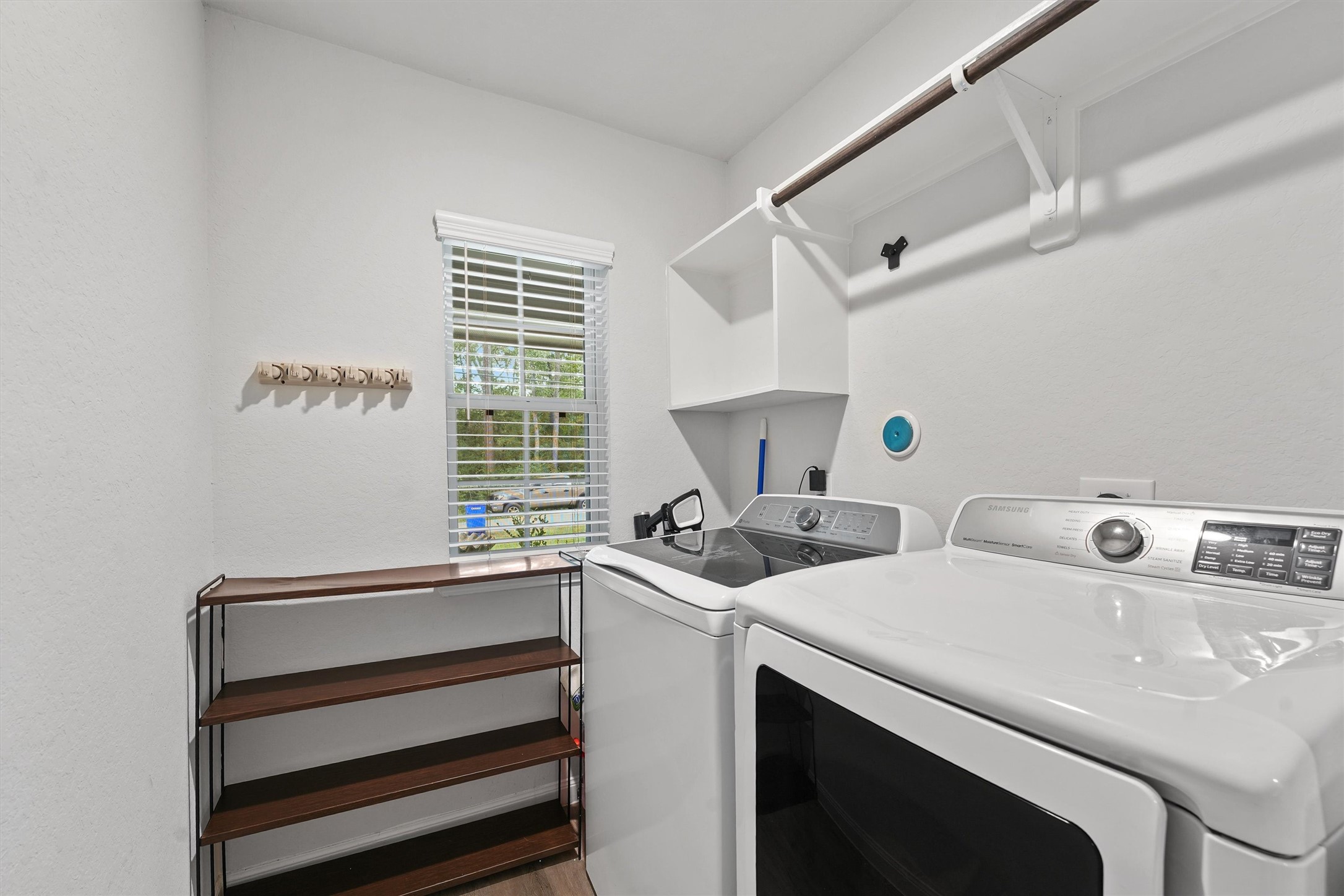 15177 Coaltown Road Willis, TX 77378 - Photo 16 of 25 a utility room with dryer and washer