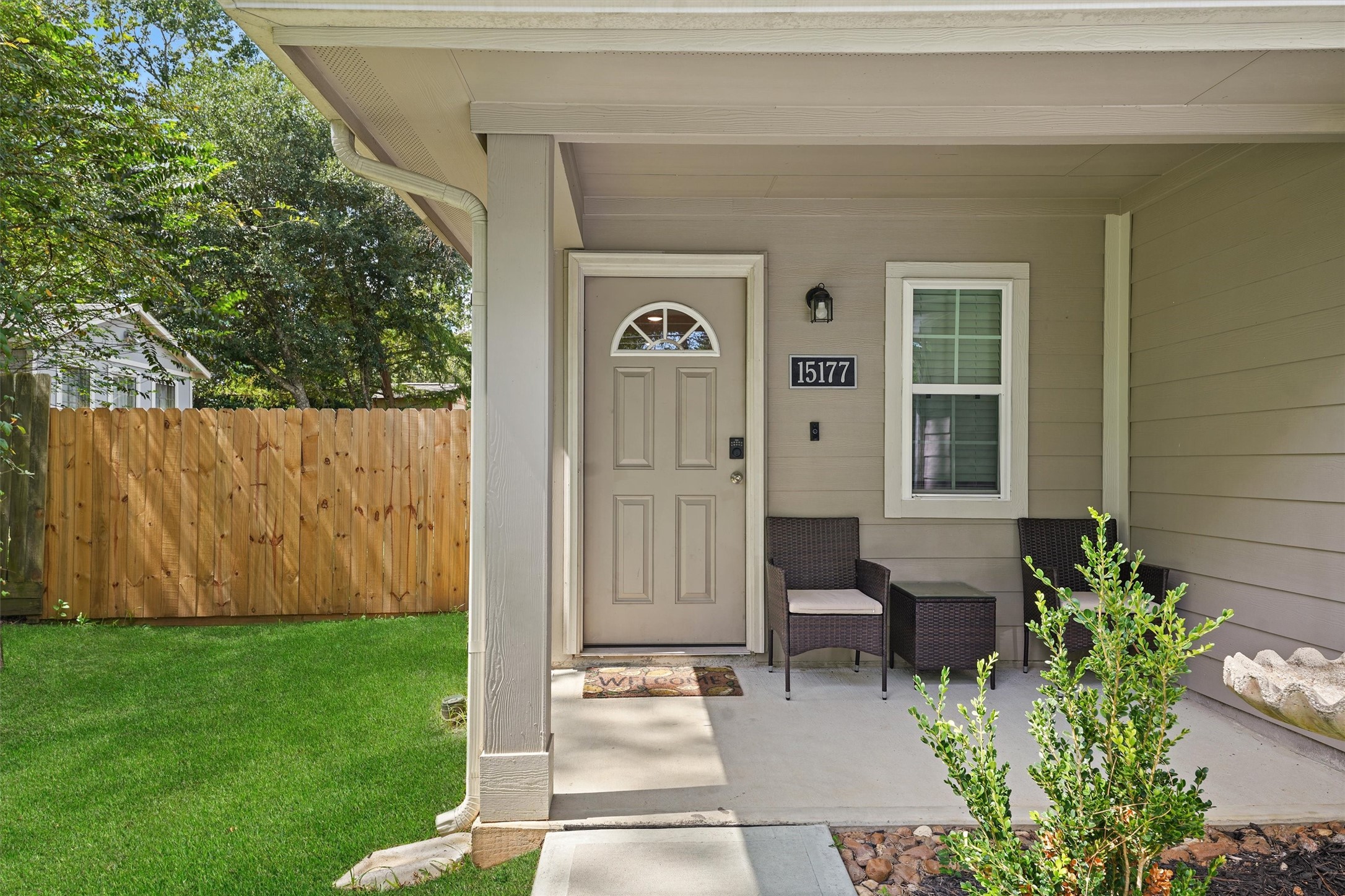15177 Coaltown Road Willis, TX 77378 - Photo 2 of 25 a front view of a house with a garden