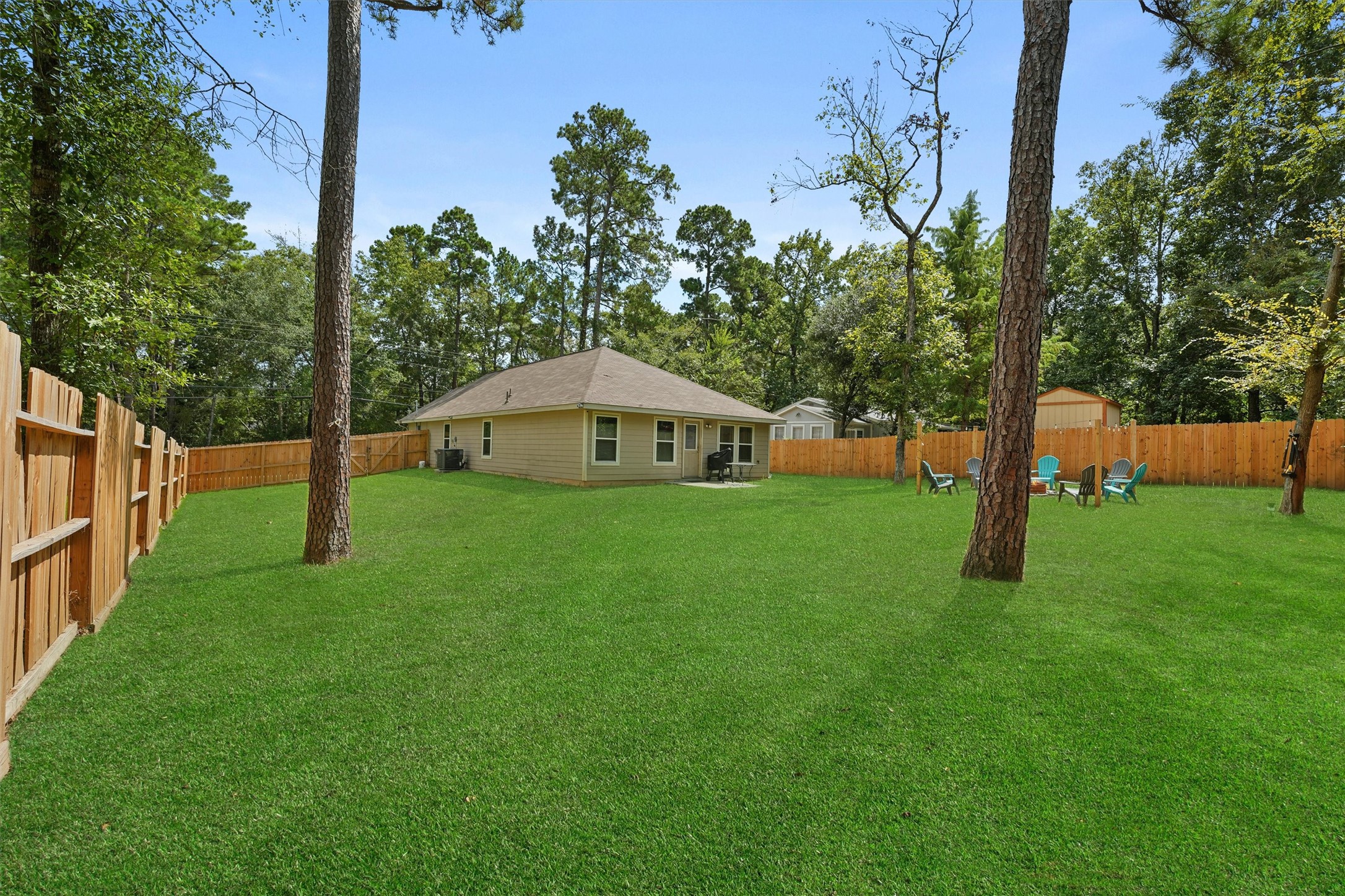 15177 Coaltown Road Willis, TX 77378 - Photo 21 of 25 a view of a house with backyard