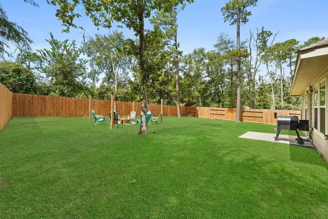 a view of a backyard with a garden