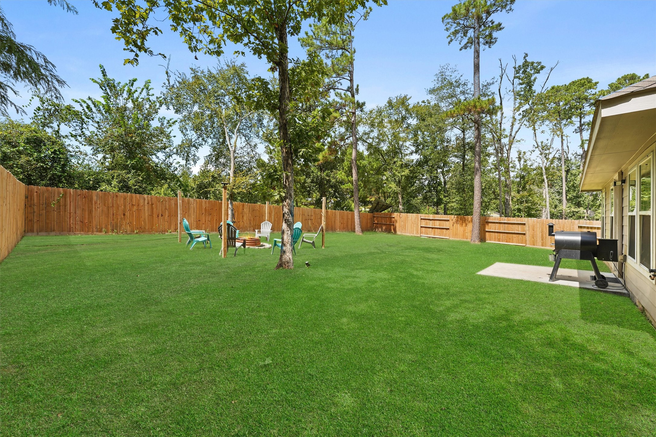 15177 Coaltown Road Willis, TX 77378 - Photo 23 of 25 a view of a backyard with a garden