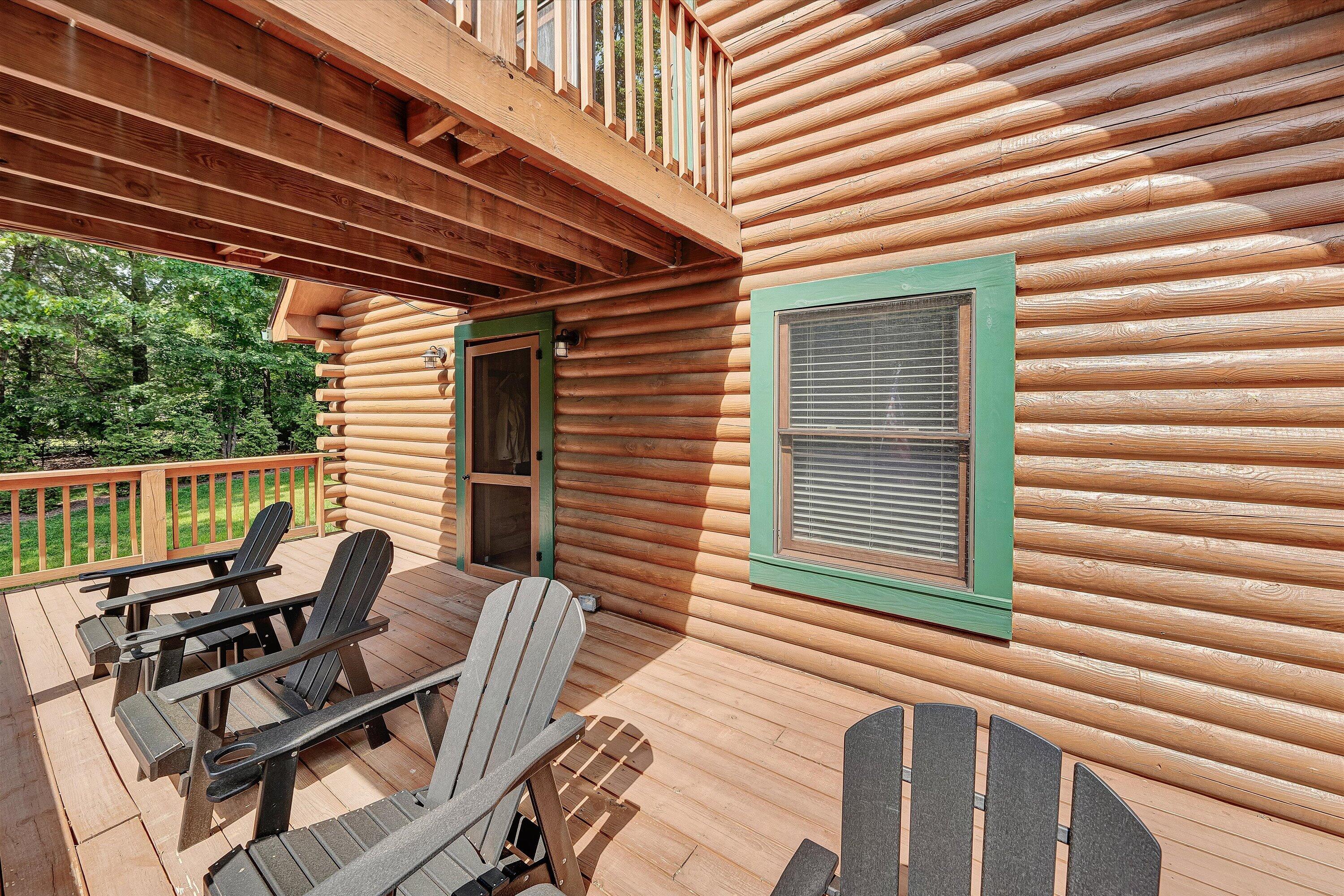 6211 Hillcrest Road Salem, VA 24153 - Photo 22 of 36 a view of a patio with a table and chairs and wooden floor