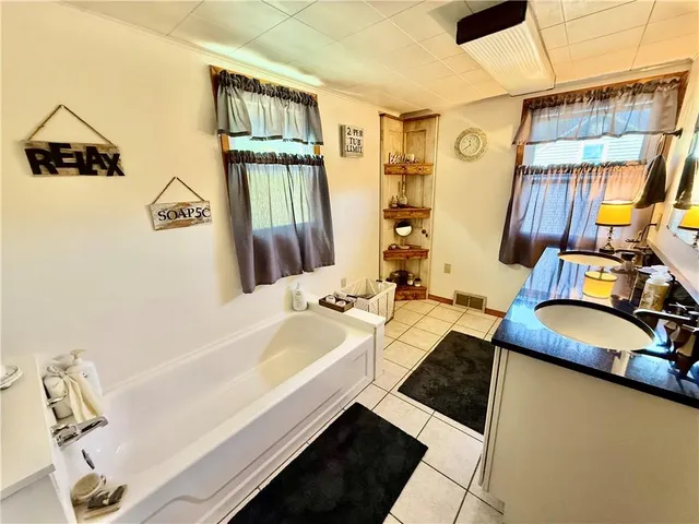 a bathroom with a sink and a bathtub