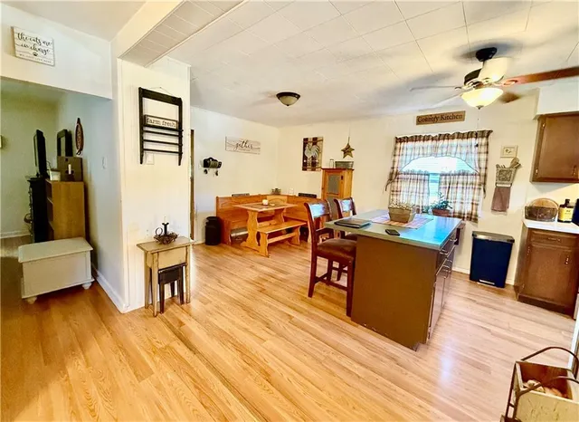 a living room with fireplace furniture and a flat screen tv