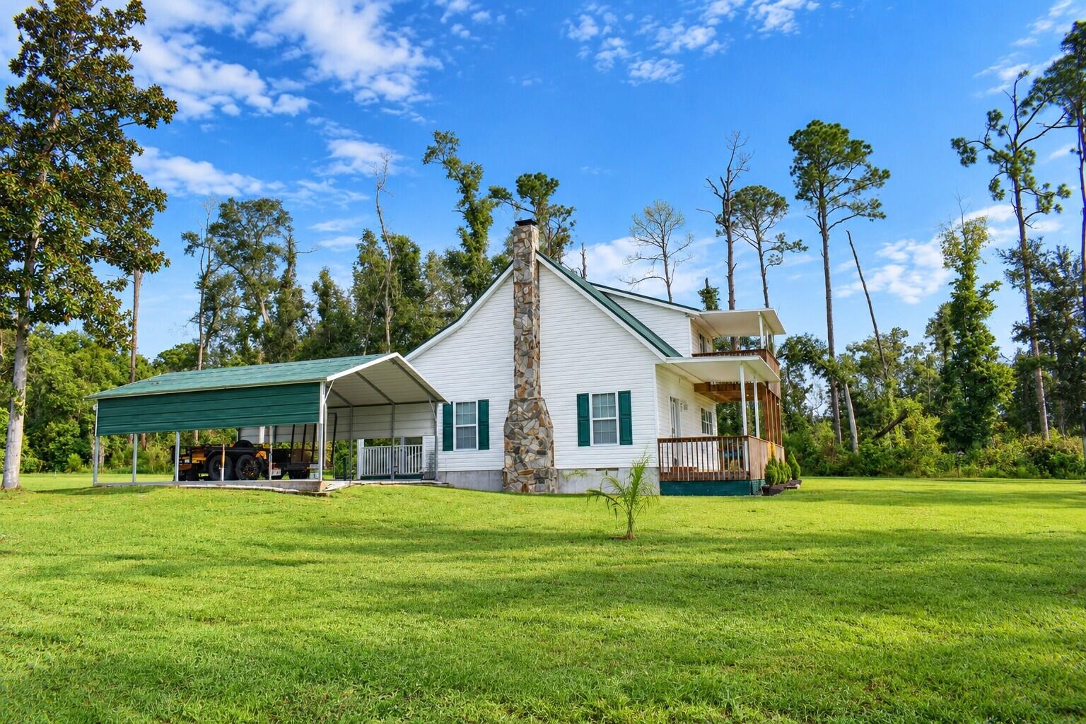 351 Northeast Bellville Road Pinetta, FL 32350 - Photo 2 of 32 side