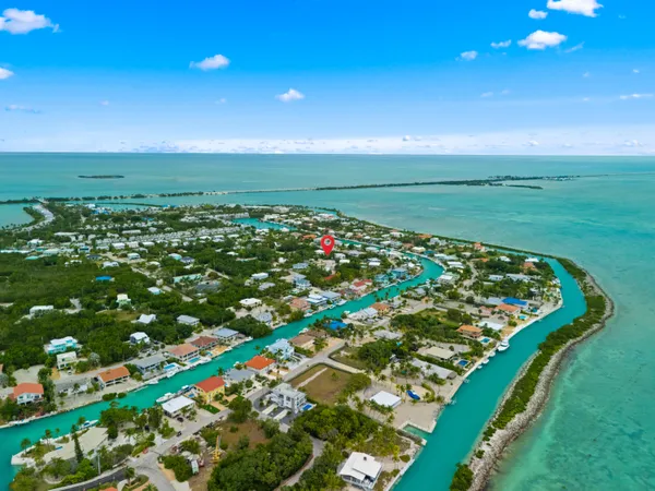 a view of a golf course with a lake