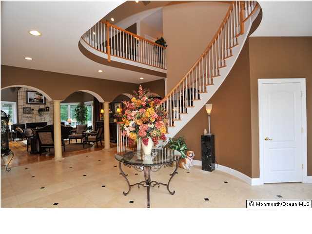 114 Stone Hill Road Colts Neck, NJ 07722 - Photo 2 of 25 a view of entryway livingroom and hall