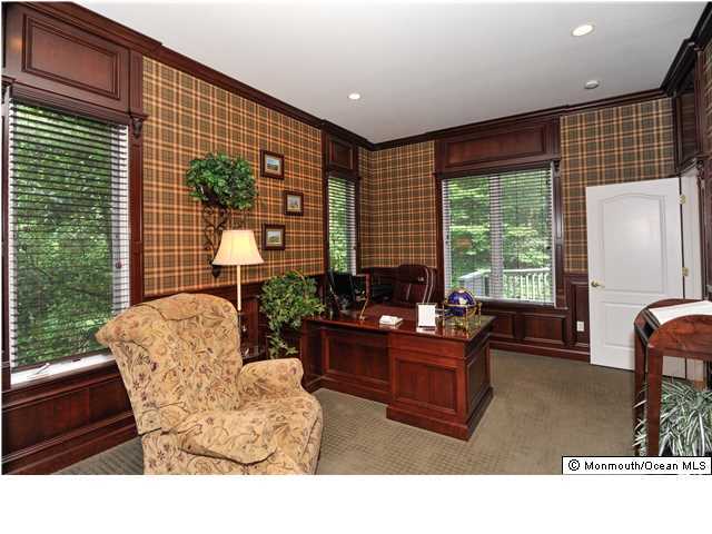114 Stone Hill Road Colts Neck, NJ 07722 - Photo 6 of 25 a living room with furniture and a large window