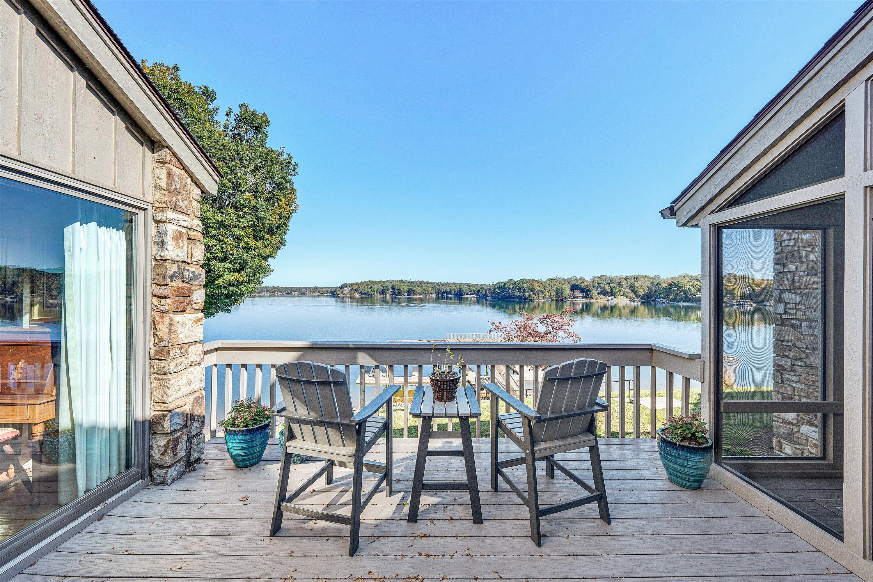 112 Gangplank Circle Moneta, VA 24121 - Photo 19 of 56 a roof deck with table and chairs and wooden floor