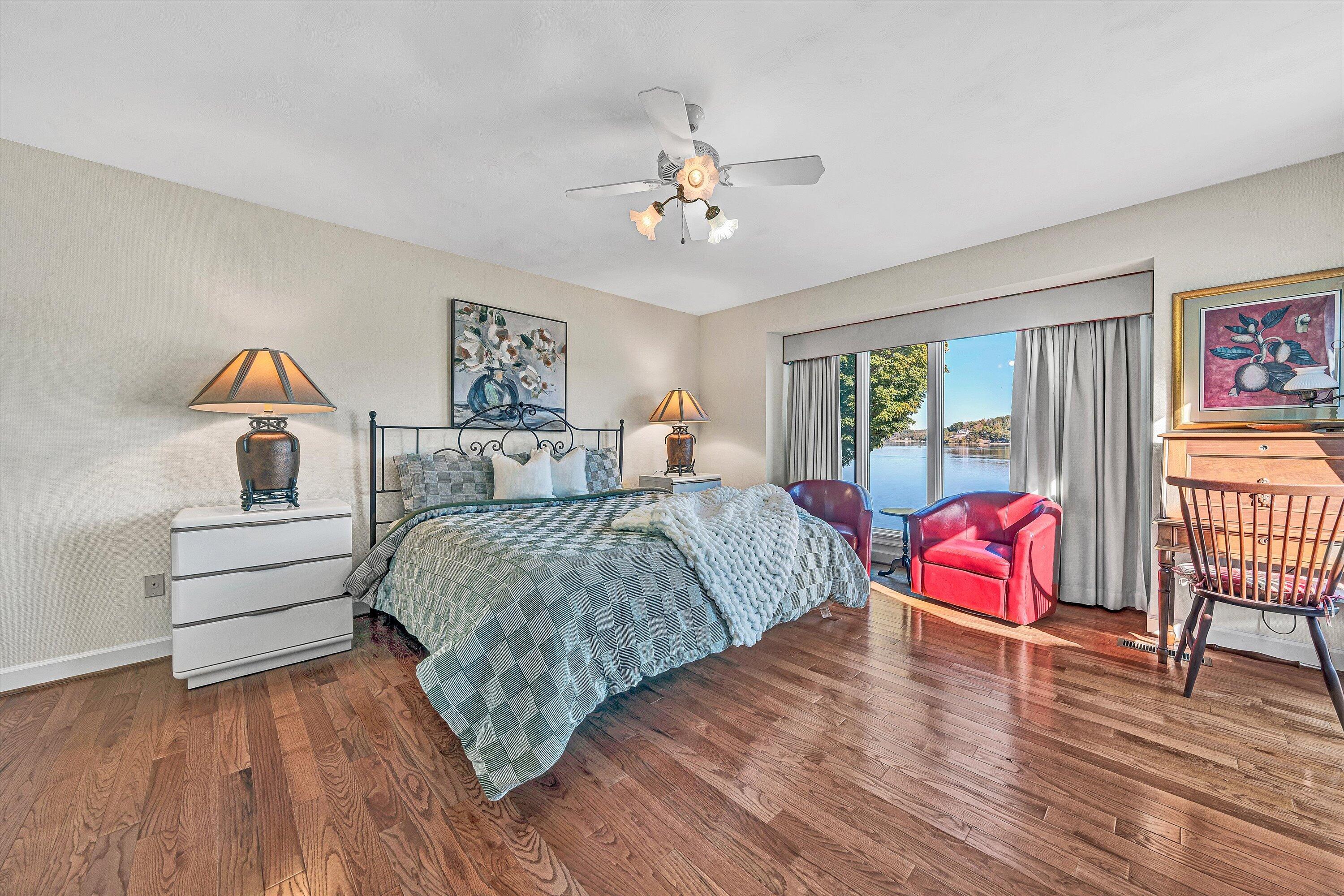 112 Gangplank Circle Moneta, VA 24121 - Photo 20 of 56 a bedroom with bed and wooden floor