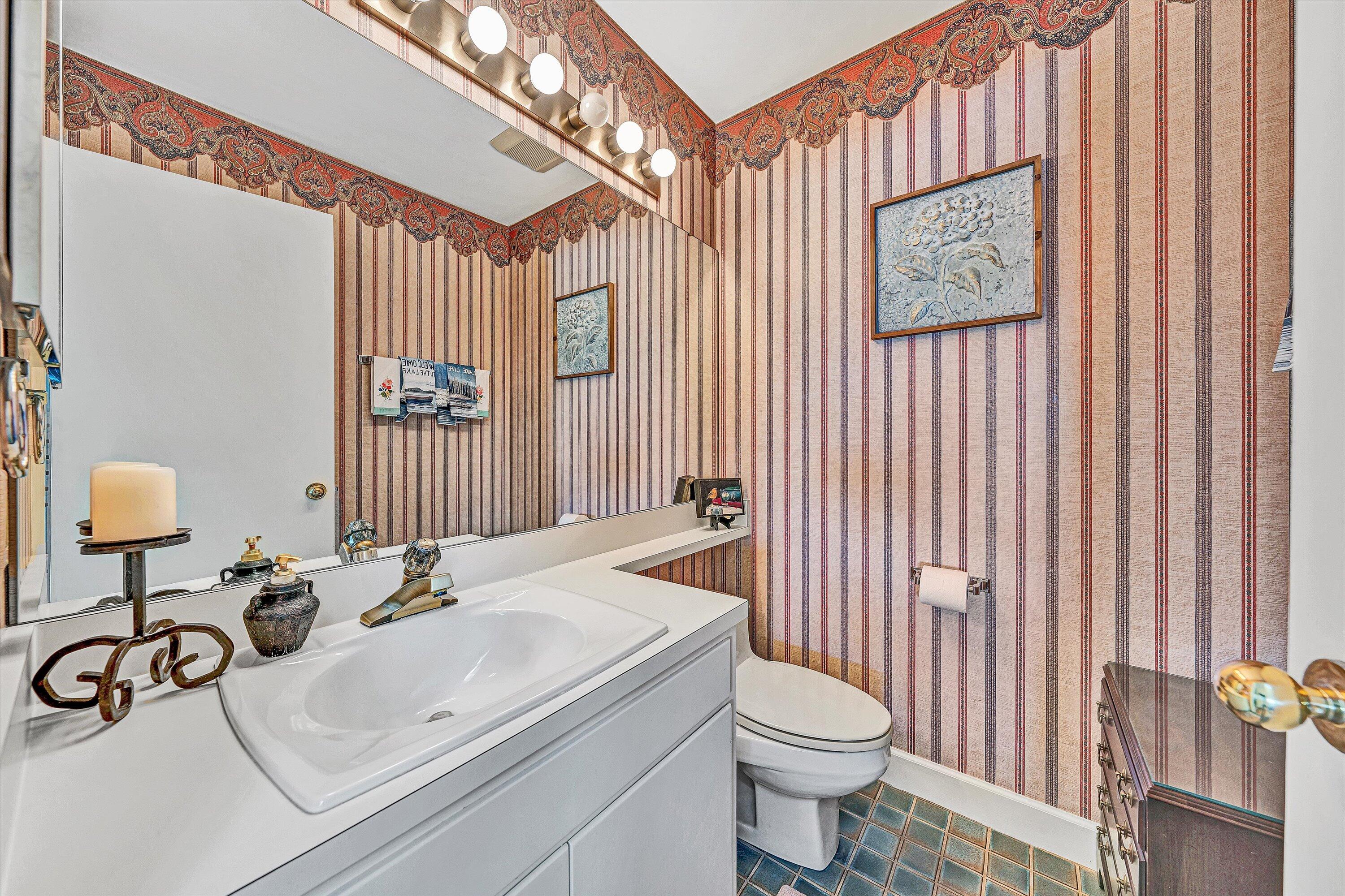 112 Gangplank Circle Moneta, VA 24121 - Photo 28 of 56 a bathroom with a sink a toilet and mirror