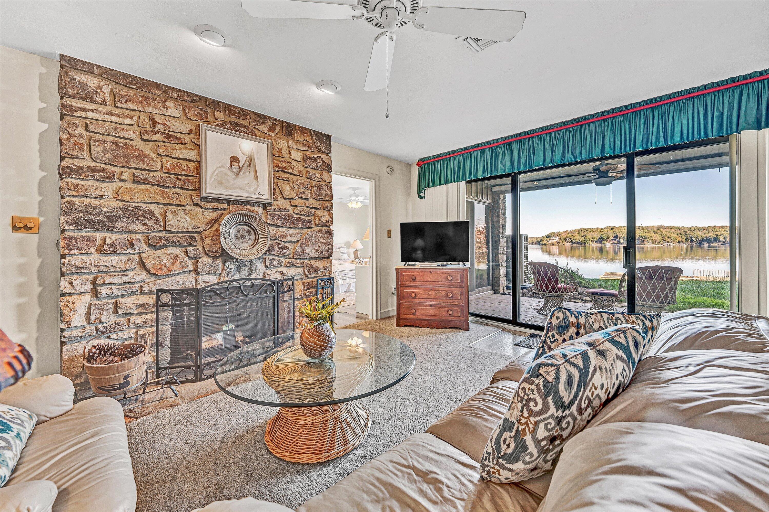112 Gangplank Circle Moneta, VA 24121 - Photo 33 of 56 a living room with furniture and a large window