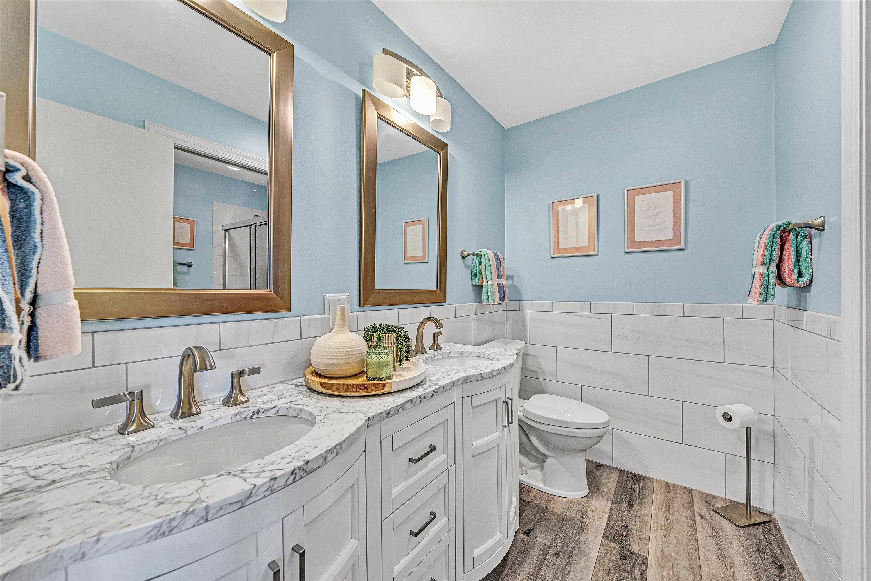 112 Gangplank Circle Moneta, VA 24121 - Photo 40 of 56 a bathroom with a granite countertop sink mirror and toilet