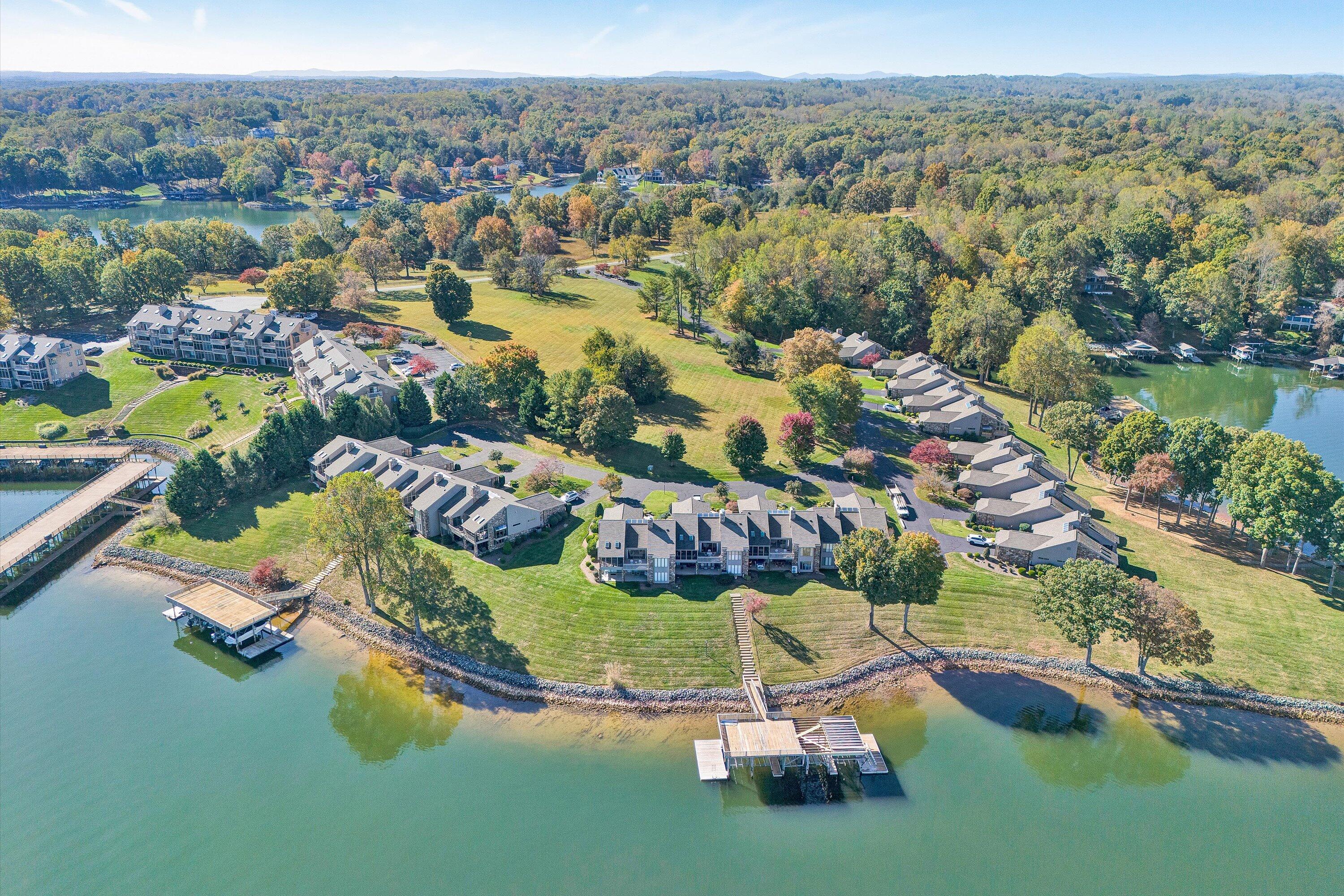 112 Gangplank Circle Moneta, VA 24121 - Photo 4 of 56 an aerial view of residential house with outdoor space and lake view