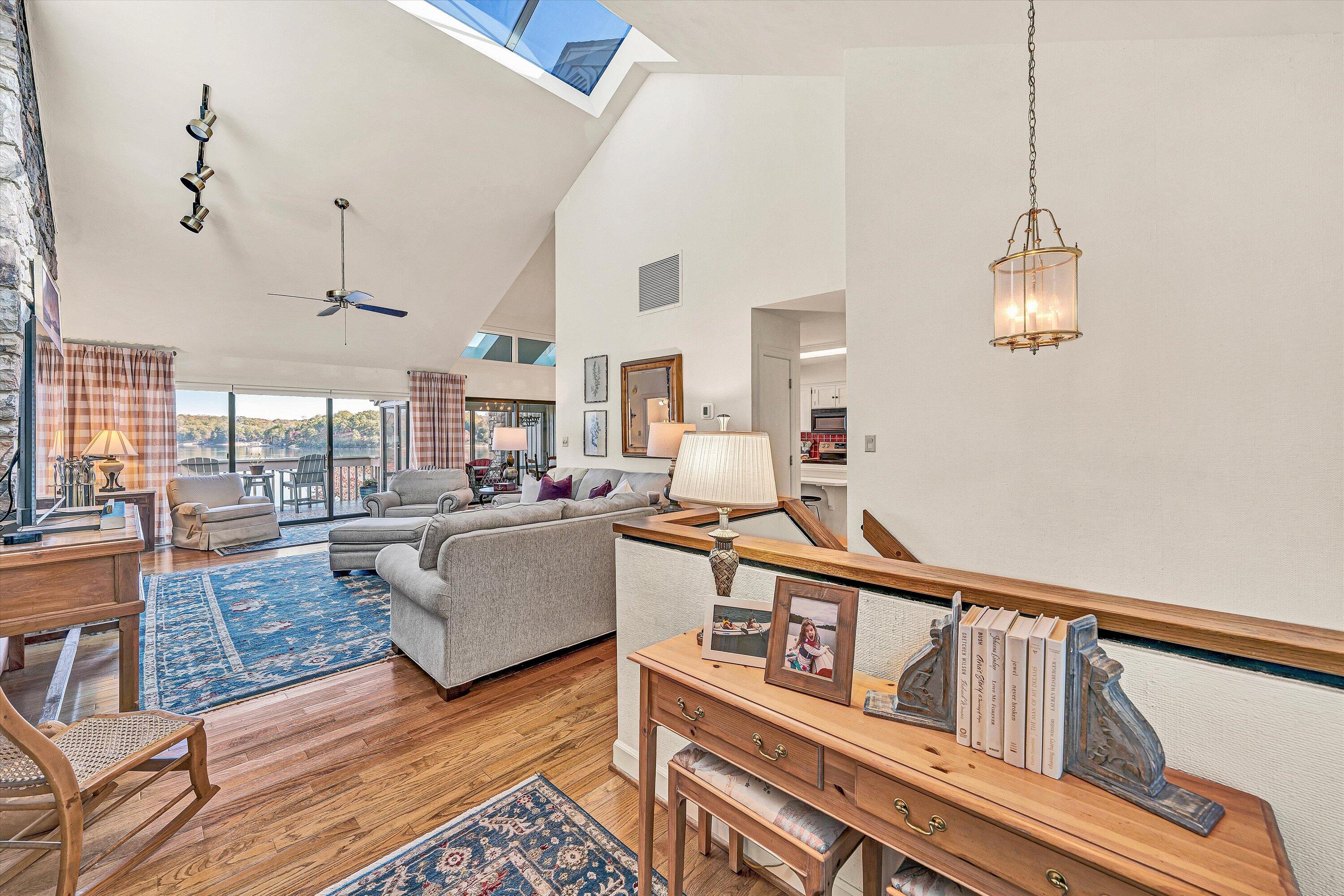 112 Gangplank Circle Moneta, VA 24121 - Photo 5 of 56 a living room with furniture and a wooden floor