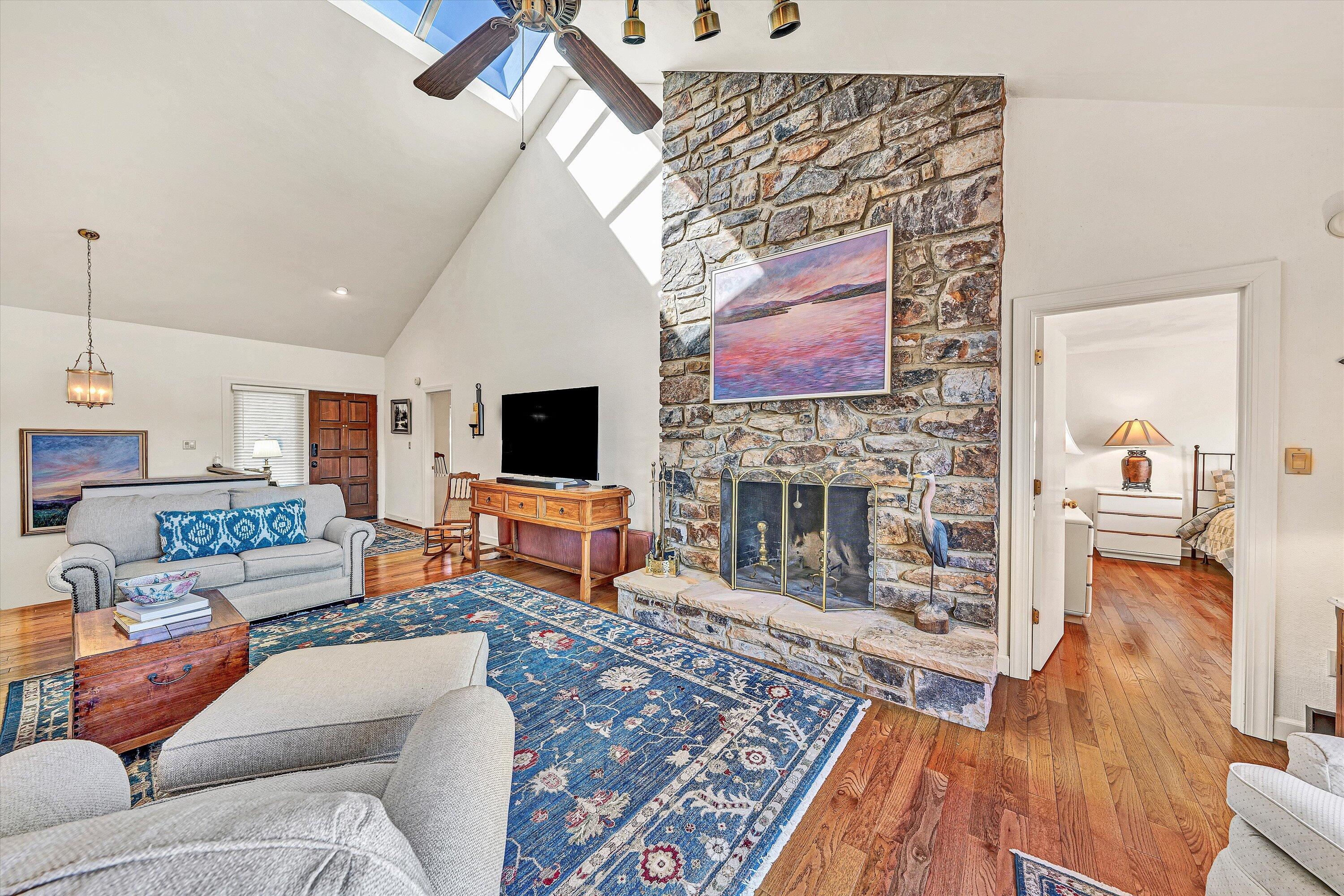 112 Gangplank Circle Moneta, VA 24121 - Photo 9 of 56 a living room with furniture and a fireplace