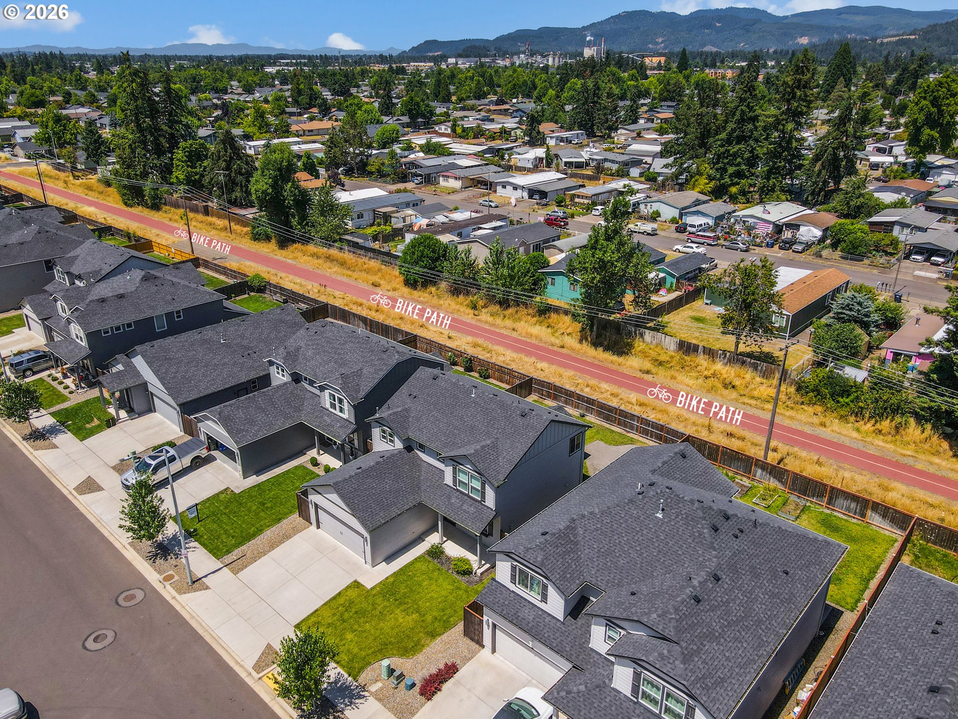 5290 Squirrel Street Springfield, OR 97478 - Photo 38 of 41 an aerial view of residential houses with outdoor space