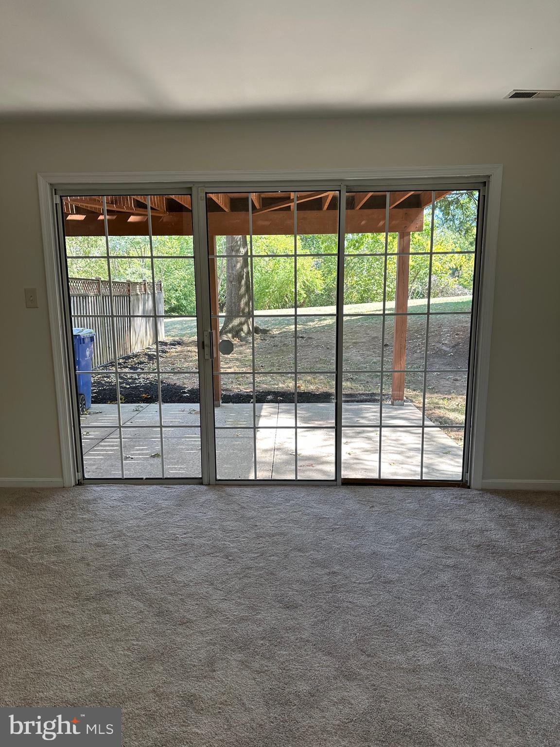 929 Jubal Way Frederick, MD 21701 - Photo 14 of 20 LL Family Rm pt 2 Looking Out to Patio and Trees