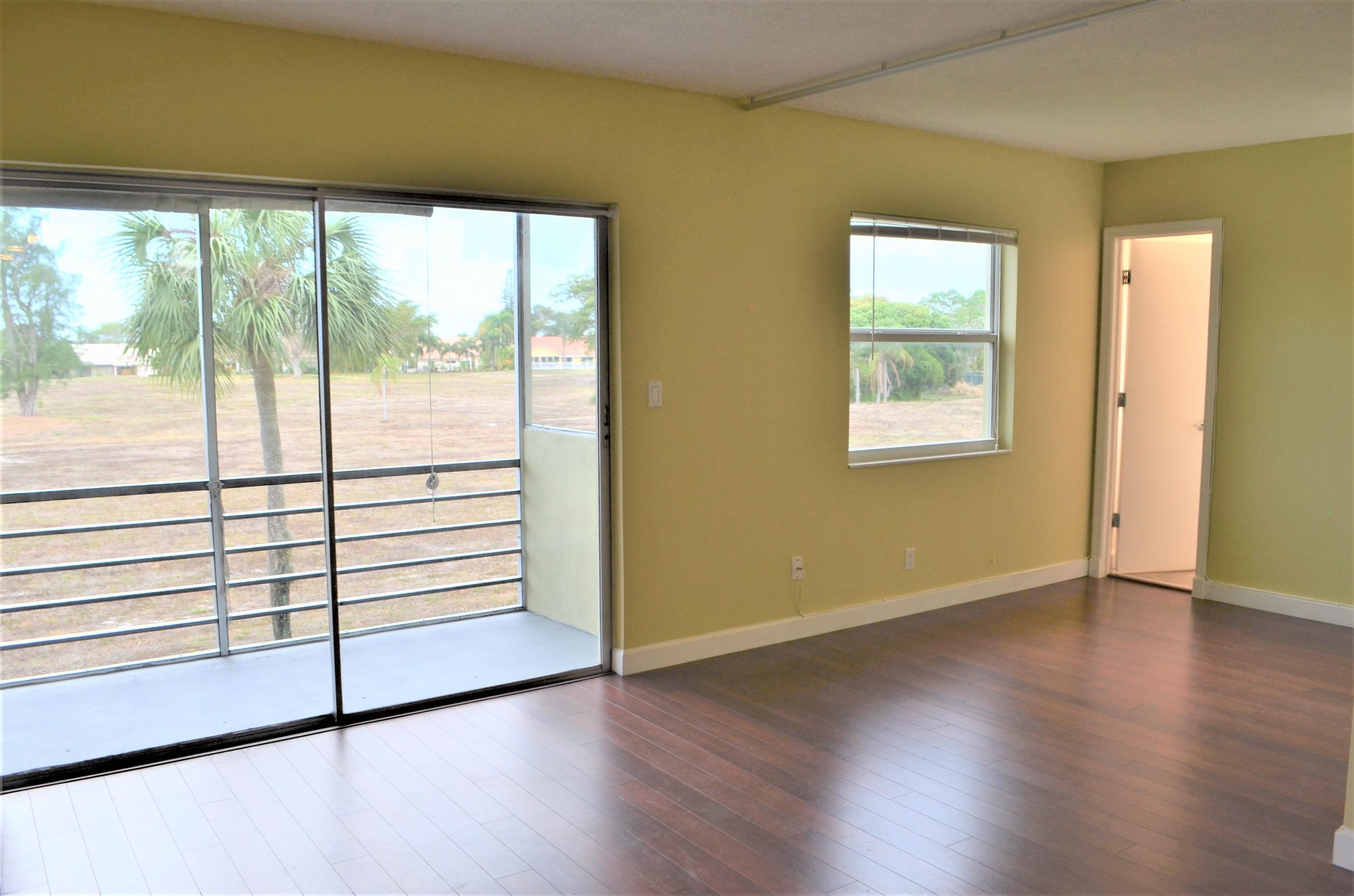 5701 Northwest 2nd Avenue, Unit 2070 Boca Raton, FL 33487 - Photo 8 of 26 Living Room & Den