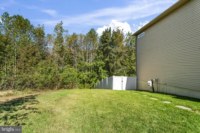 a view of a balcony with furniture