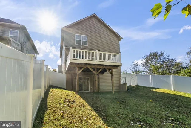 a view of backyard with green space