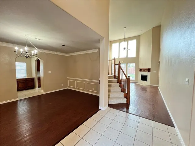 a view of entryway with stairs and wooden floor