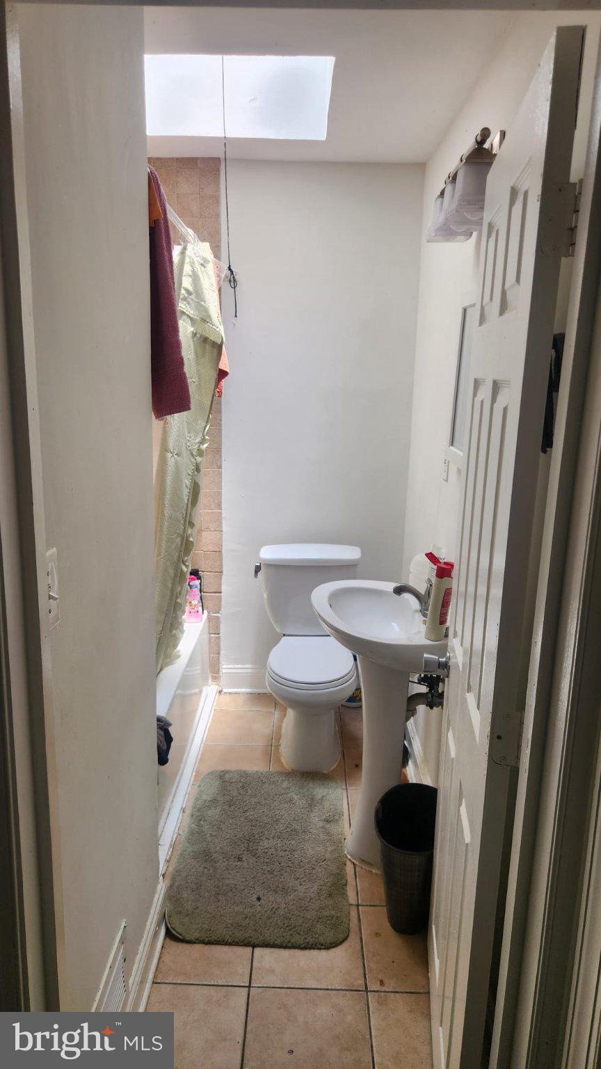 4432 Manorview Road Baltimore, MD 21229 - Photo 6 of 24 Cozy bathroom with natural light.
