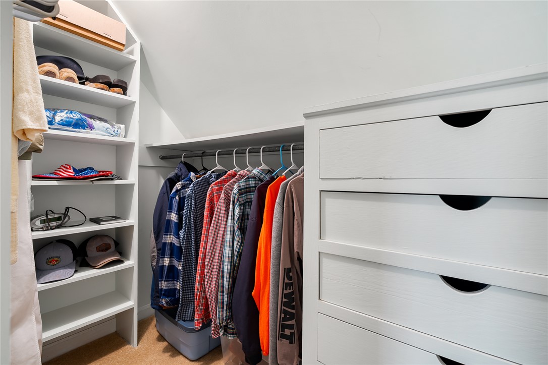 401 Berkshire Hill Anderson, SC 29621 - Photo 23 of 39 This organized closet features ample storage with built-in shelving and convenient hanging space.