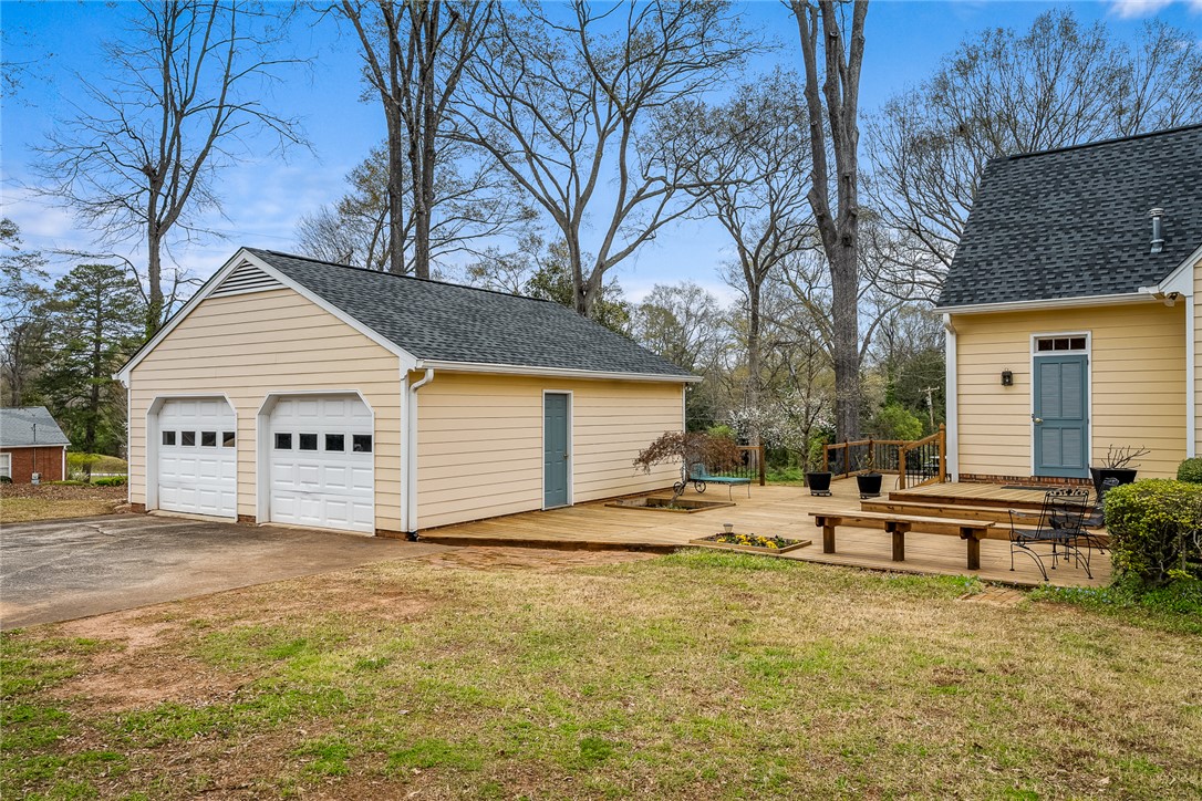 401 Berkshire Hill Anderson, SC 29621 - Photo 31 of 39 This charming residence features a detached garage and an inviting outdoor deck, perfect for leisure.