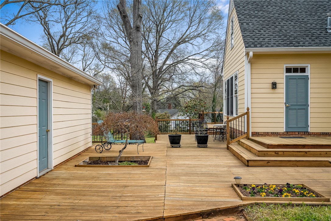 401 Berkshire Hill Anderson, SC 29621 - Photo 33 of 39 This spacious outdoor deck offers ample room for entertaining and relaxation amidst natural surroundings.