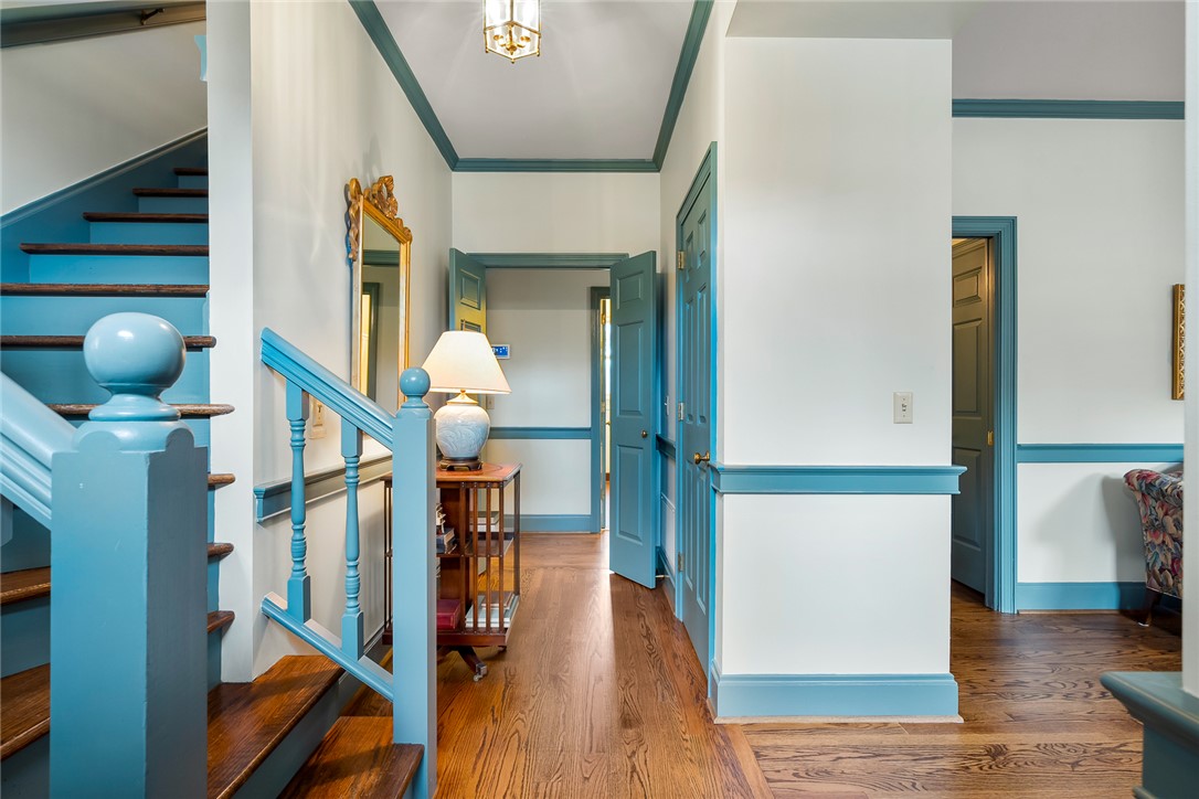 401 Berkshire Hill Anderson, SC 29621 - Photo 4 of 39 A graceful staircase with intricate balusters complements the warm hardwood floors in this inviting entryway.