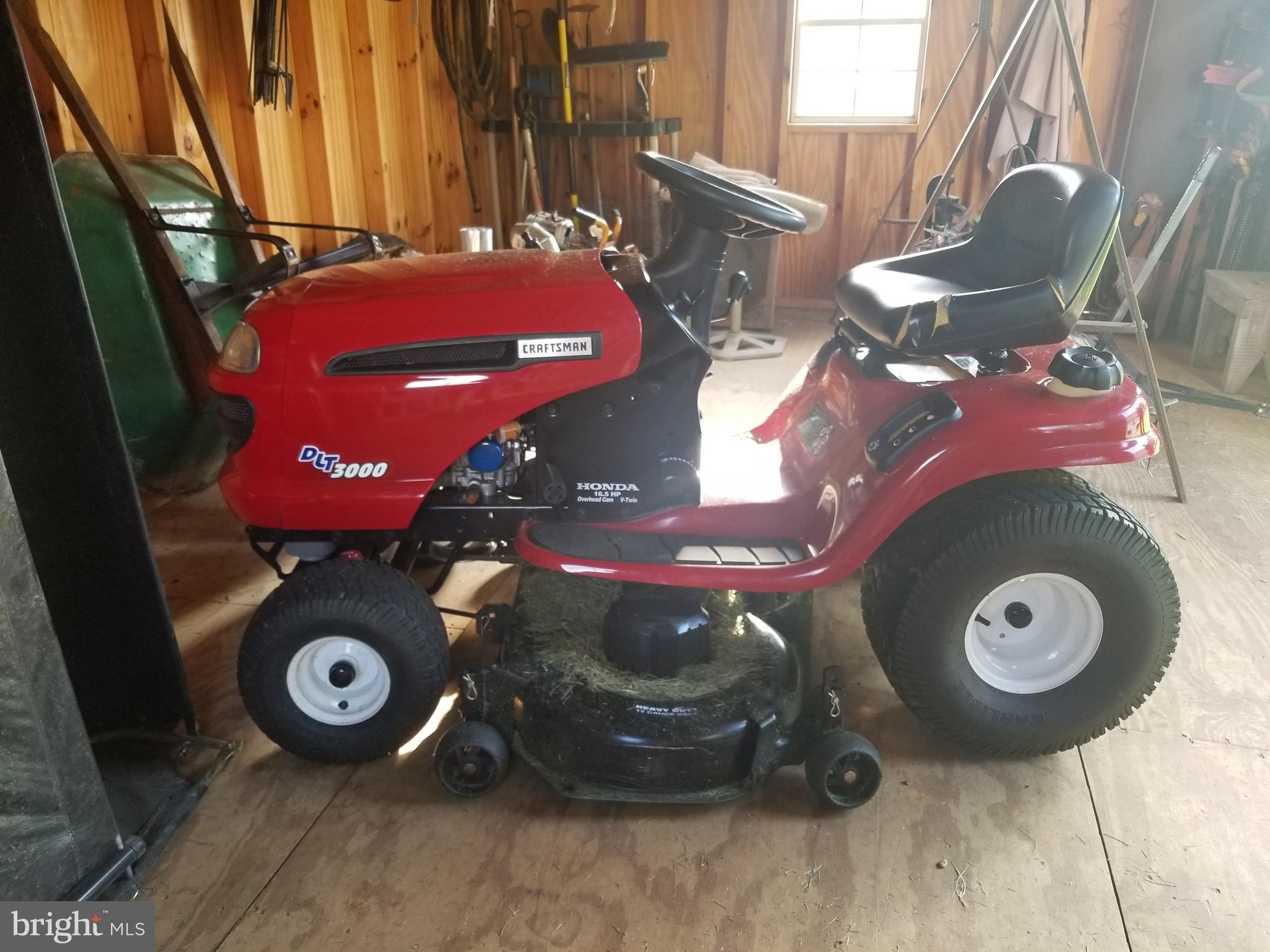 53 Thumper Drive Ranson, WV 25438 - Photo 8 of 13 Lawn Tractor that conveys.