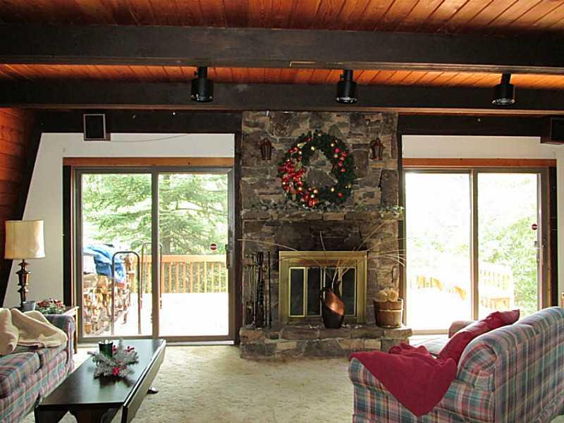 281 Alpine Heights Road Champion, PA 15622 - Photo 2 of 25 Living Room. Double sliding doors to access the front deck