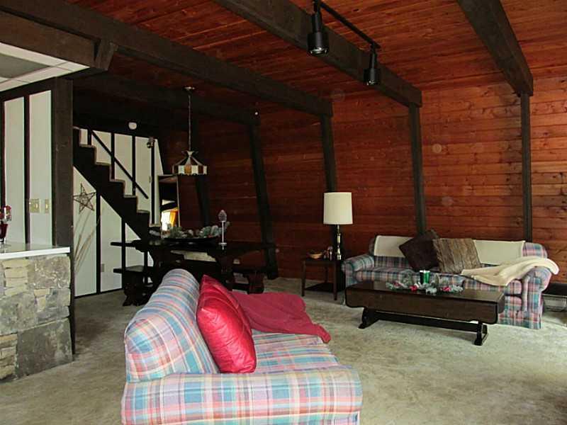 281 Alpine Heights Road Champion, PA 15622 - Photo 8 of 25 Living Room. Looking into dining
