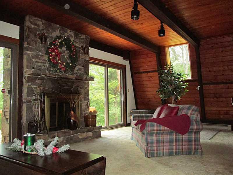 281 Alpine Heights Road Champion, PA 15622 - Photo 9 of 25 Living Room. Looking out to right side slider