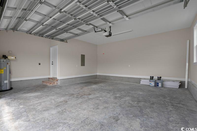 6927 Pauley Swamp Road Conway, SC 29527 - Photo 20 of 40 Garage with electric water heater and electric panel