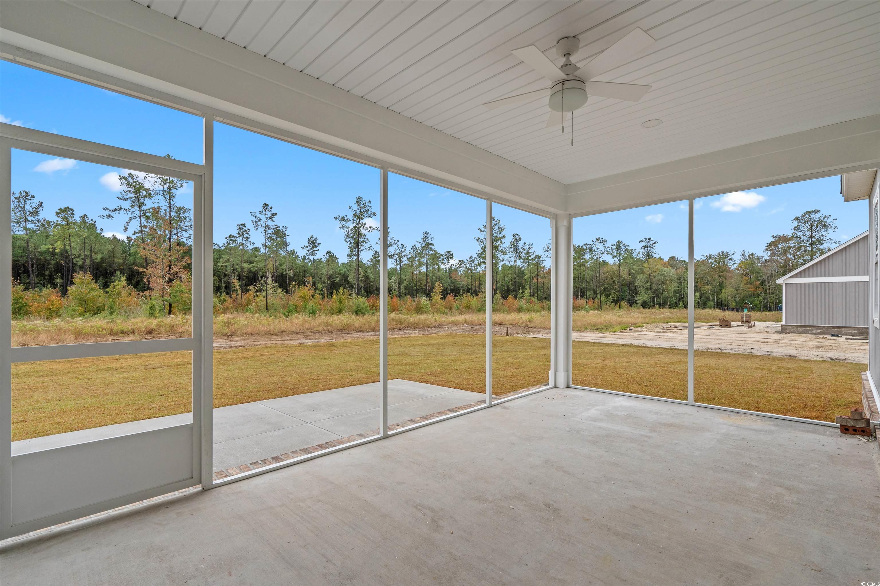 6927 Pauley Swamp Road Conway, SC 29527 - Photo 21 of 40 Unfurnished sunroom featuring a ceiling fan