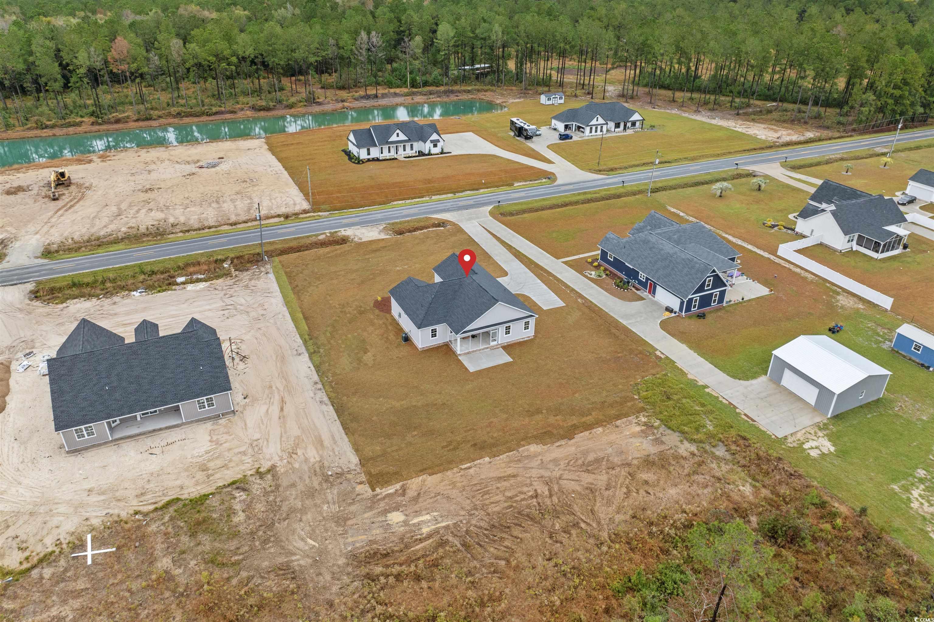 6927 Pauley Swamp Road Conway, SC 29527 - Photo 6 of 40 Aerial view of residential area featuring a large body of water