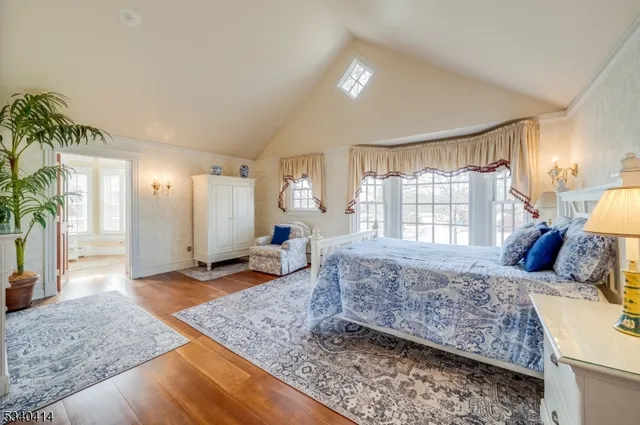 a bed room with a bed and a couch