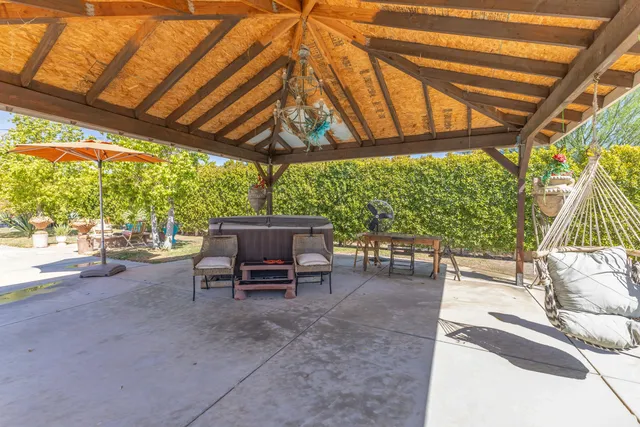 a view of a yard with an outdoor space