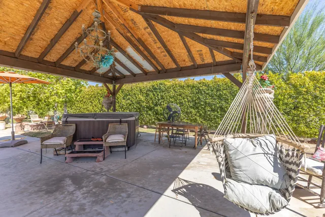 a view of a backyard with palm trees