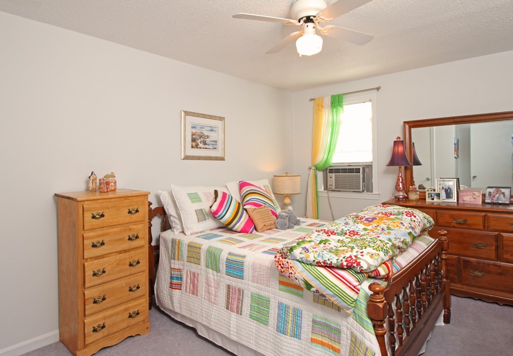11 Bayberry Hill Road Townsend, MA 01469 - Photo 12 of 21 a bedroom with a bed and a dresser in it