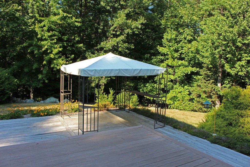 11 Bayberry Hill Road Townsend, MA 01469 - Photo 16 of 21 a garden view with a seating space