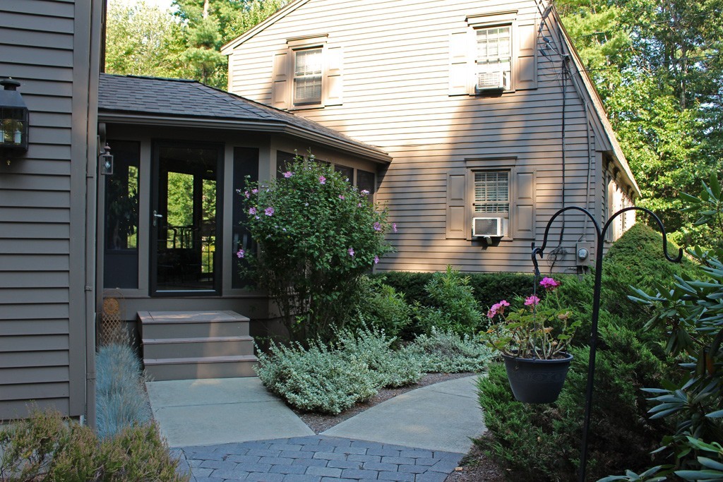 11 Bayberry Hill Road Townsend, MA 01469 - Photo 17 of 21 a view of a house with potted plants